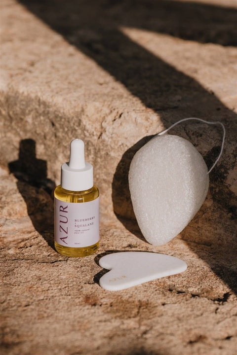 gua-sha-en-jade-blanc-pour-le-visage